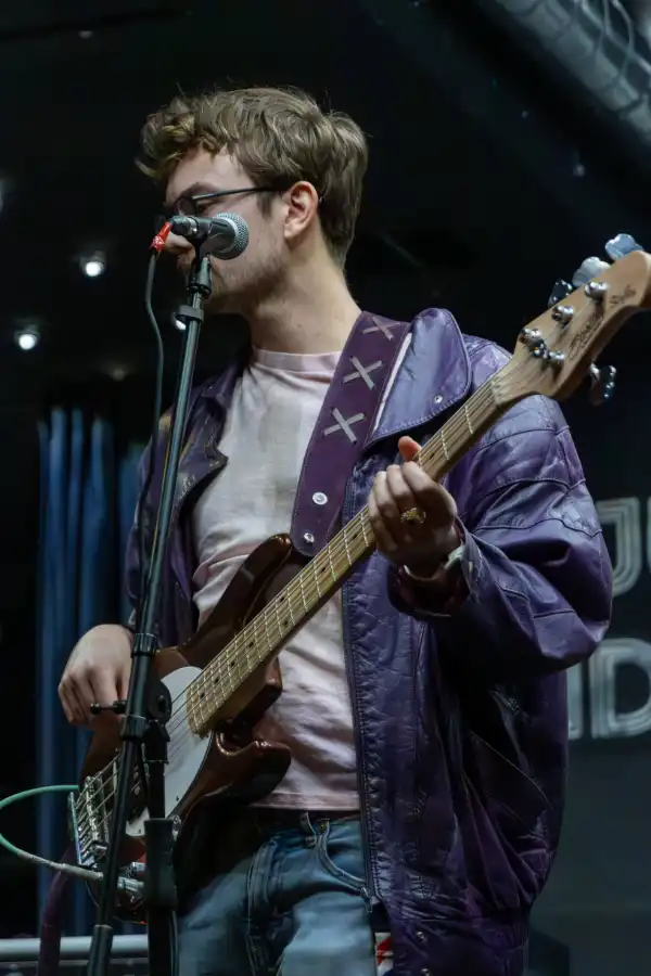 Man singing with guitar