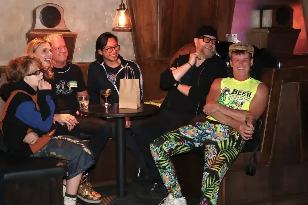 Friends in a booth laughing