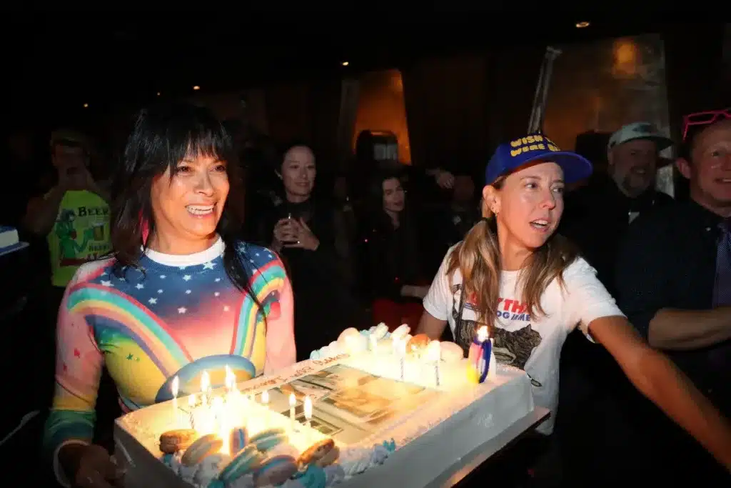 Birthday cake being carried